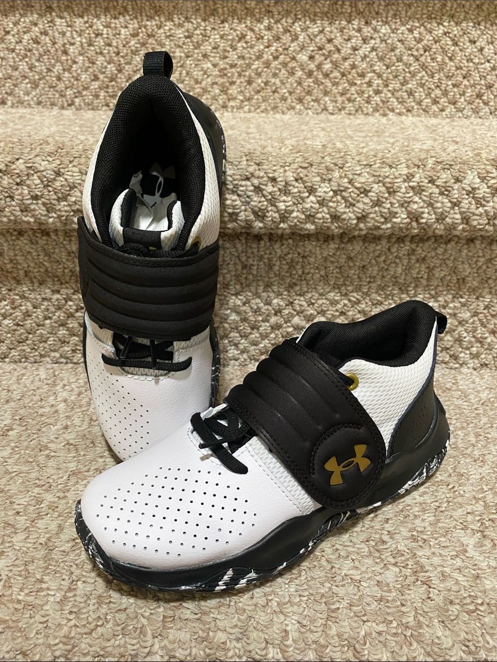 Under Armour Kids White and Black Athletic Sneakers with Gold Logo